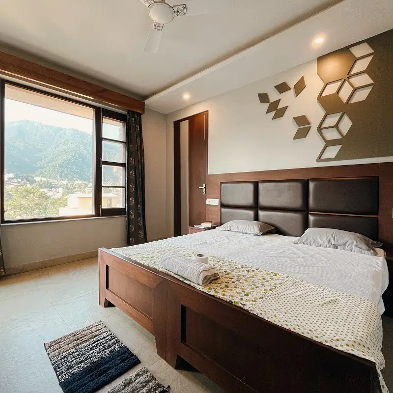 Deluxe double room with balcony and valley view at Kundalini Yoga Ashram